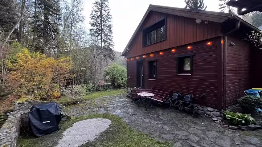 Cottage by the stream