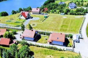 Haus am See in Sunowo. & Masurische Häuser: Orchideen, Jasmin, Lilien