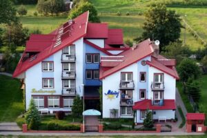 Mikołaj Białogóra Zimmer und Restaurant am Meer
