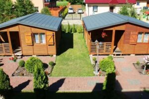 Zimmer und Ferienhäuser in SŁONECZNY DWOREK Günstige Unterkünfte Ferienhäuser am Meer
