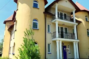 The Castle Suites & Apartments parking lot