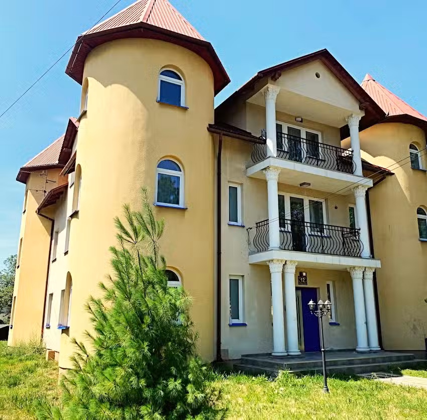 The Castle Suites & Apartments parking lot